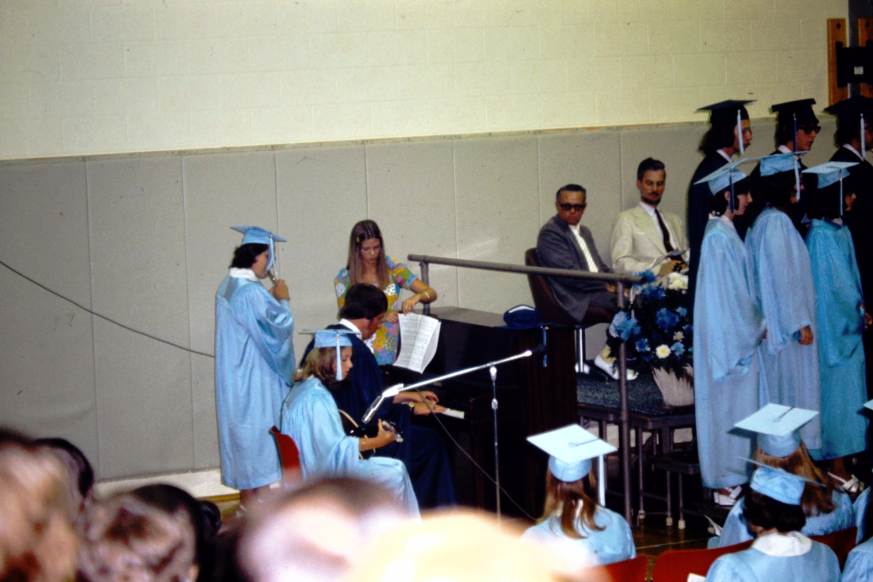 Musicians accompanying the Senior Class chorus - Carol Hammond on flute, Debbie Valentine on guitar, and Erik Hansson on piano